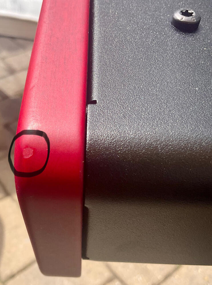 Small Blem Mark underneath Wood Side Panel