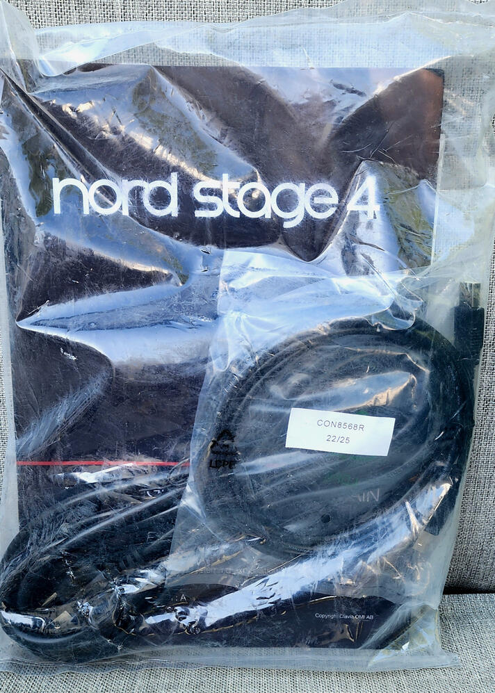 Owner's Manual | AC Cord | USB Cable